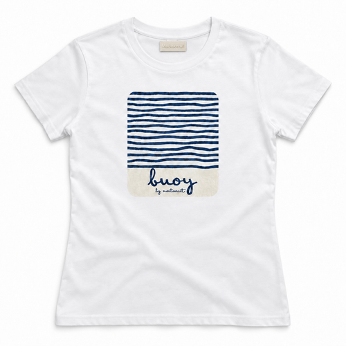 A white short-sleeve crewneck t-shirt by Montserrat, featuring a central graphic print of navy blue horizontal stripes on the top half and a cream-colored bottom half with the brand name 'buoy by Montserrat' written in navy script.